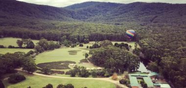 Aerial image of Cave Hill Creek camp and surrounds from a hot air balloon in the sky