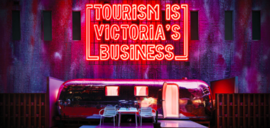 Neon sign displaying 'Tourism is Victoria's Business'
