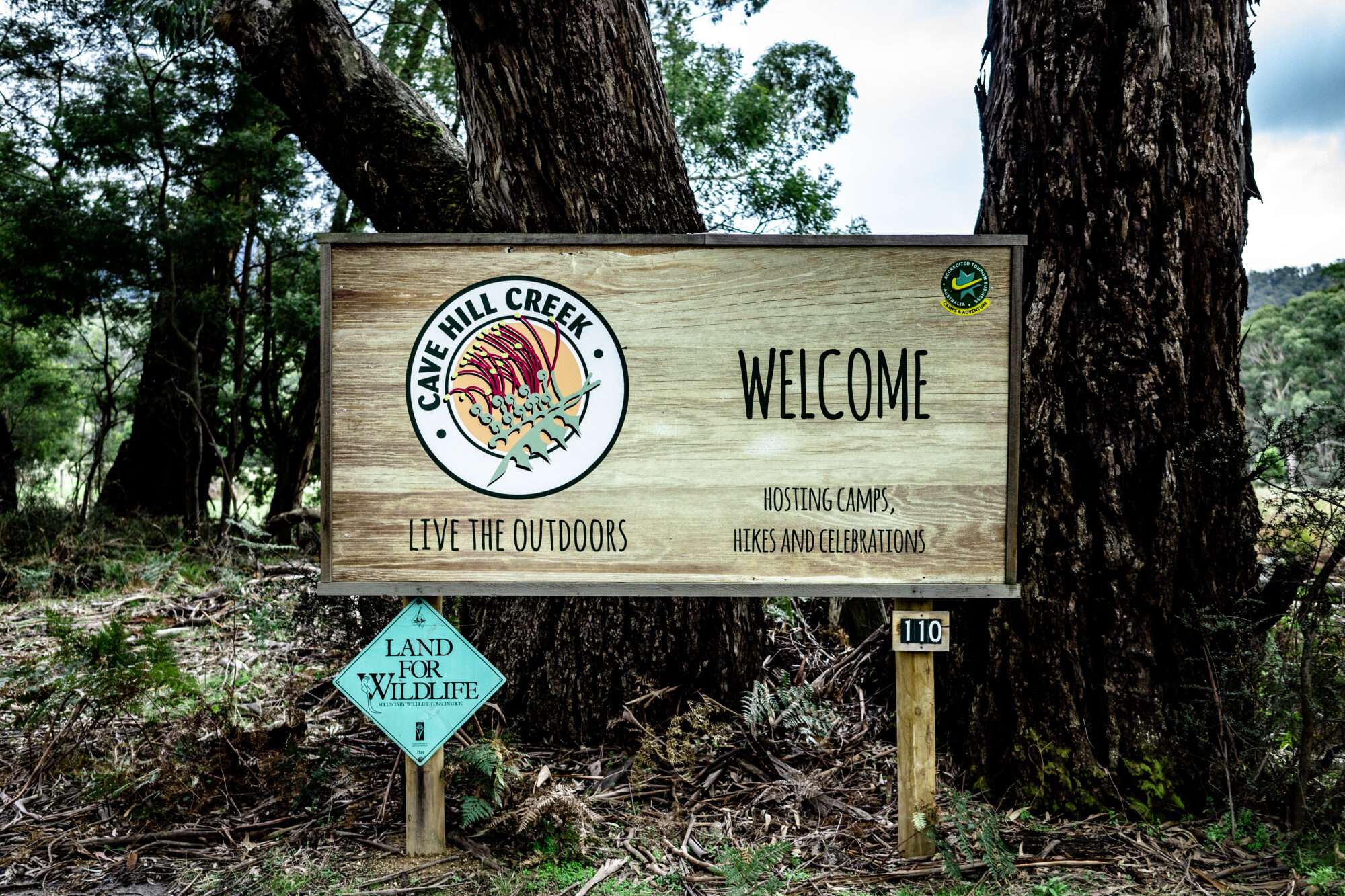 welcome to cave hill creek sign