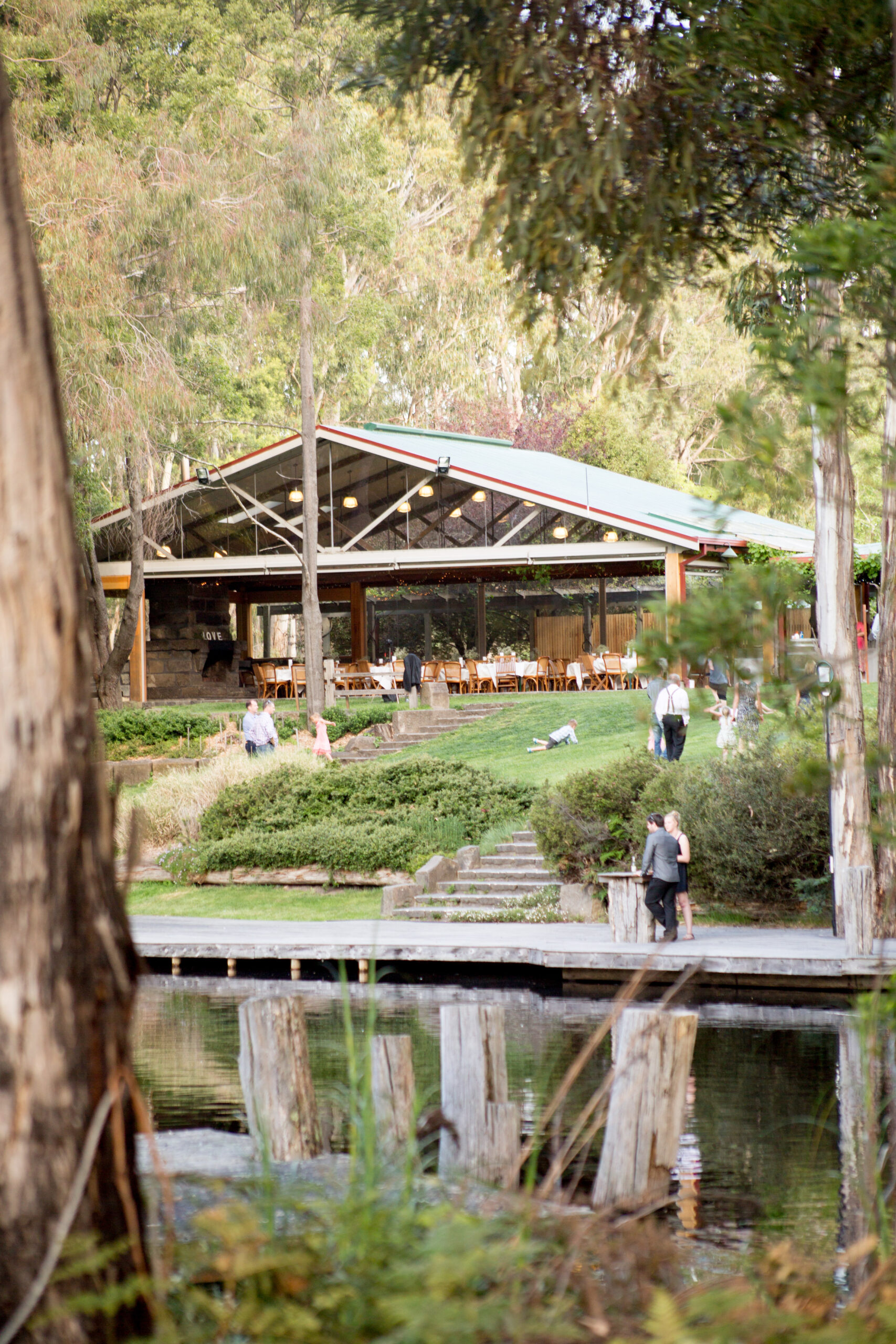 Lakeside pavilion nestled amongst gum trees