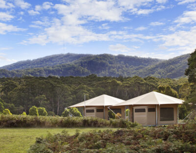 Glamping cabins with mountain views at Cave Hill Creek