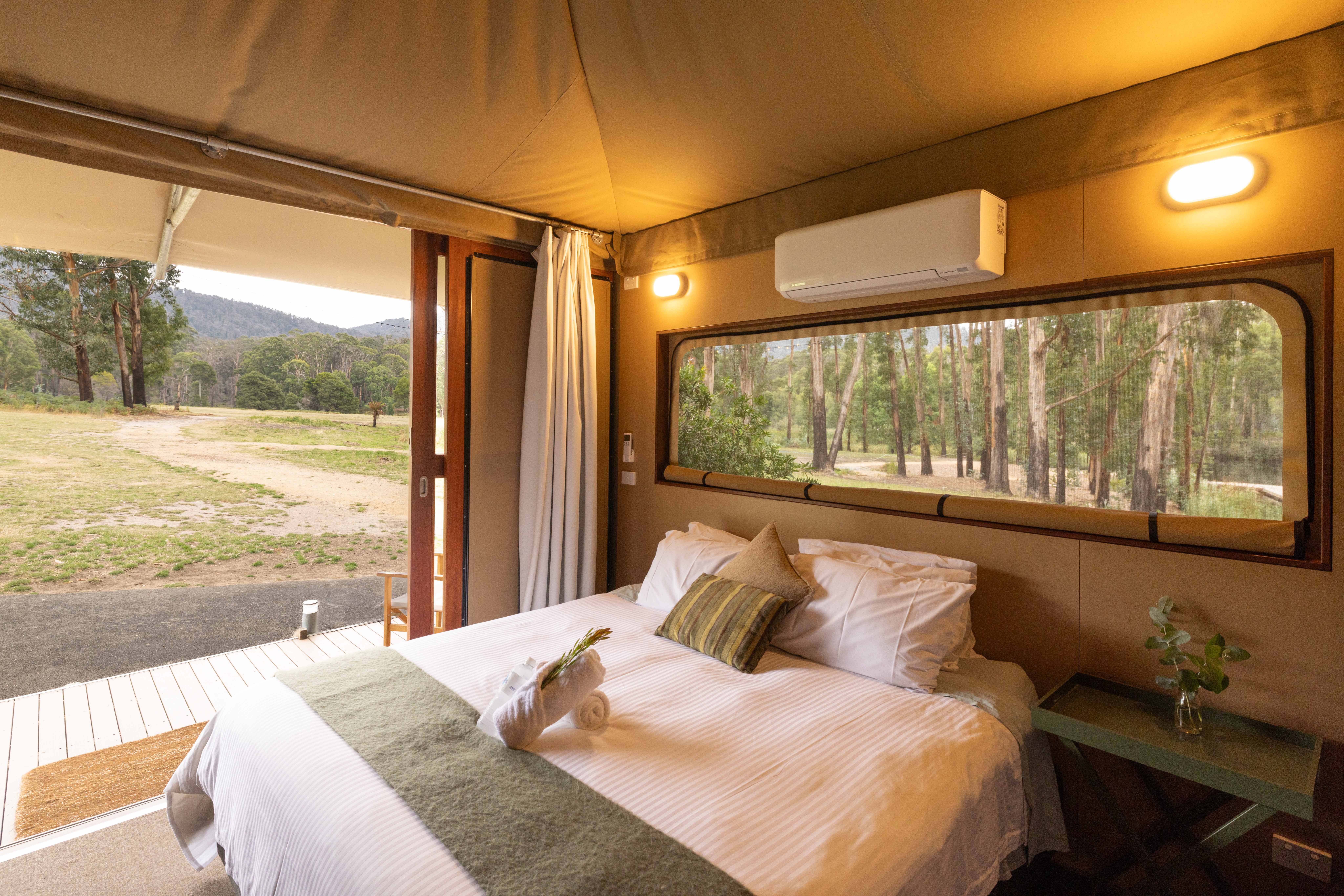 Beds made up with linen for a wedding